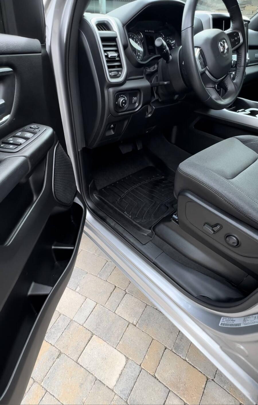 Clean truck interior and floor mat after a Wags Details interior detail