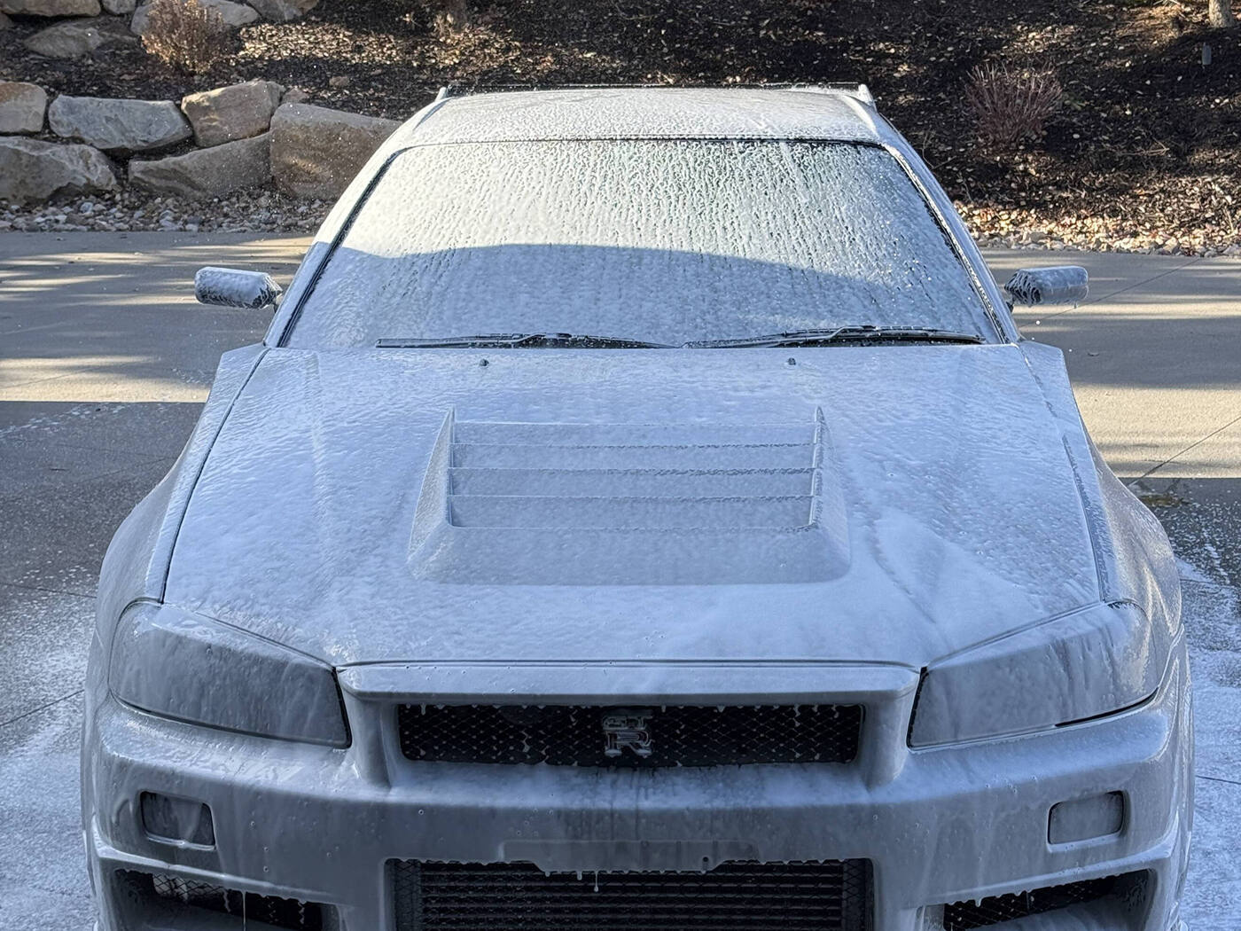Nissan Skyline GT-R under snow foam pre-wash